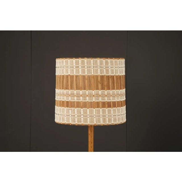 A rare and striking lampshade designed by German-born, California-based textile artist Maria Kipp, celebrated for her...