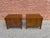 Pair of walnut nightstands from Broyhill’s “Emphasis” collection. A strong late mid-century design with clean lines,...