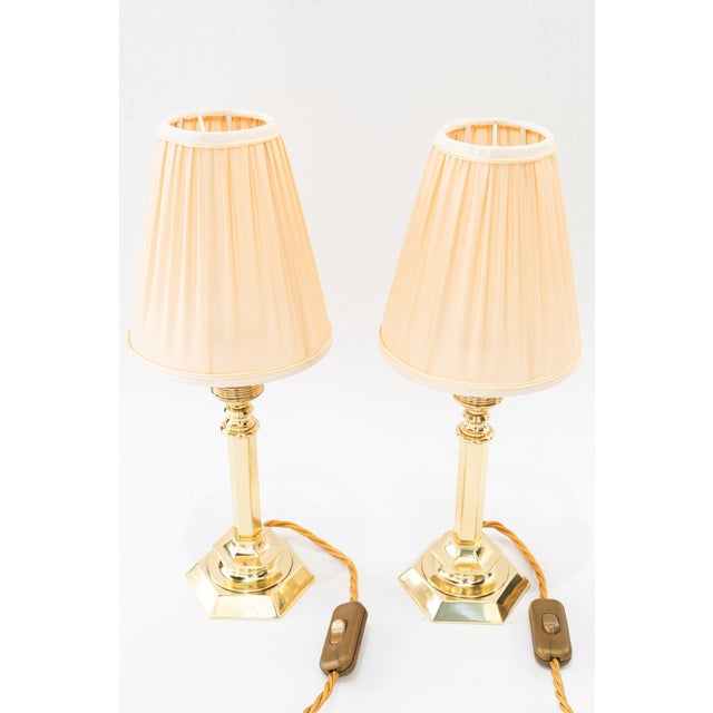 Brass polished and stove enameled the fabric shades are replaced ( new ) European Plug (up to 250V).The wiring of this...