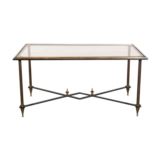 MCM cocktail table. Blackened steel and reeded brass. Attributed to Maison Jenson.