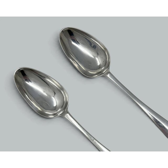 An exceptionally fine Pair George III Irish sterling silver plain form Gravy Serving Spoons. Mark of J P for John Pittar...