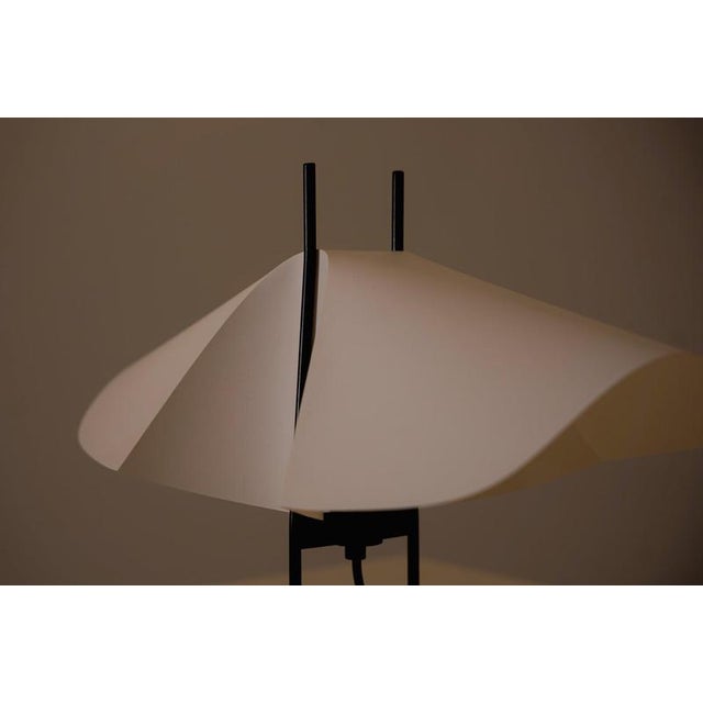 "Cho" means butterfly in Japanese, a concept reflected in the lamp's design. The light, almost floating shade contrasts...
