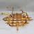A striking piece of French mid-century design — a lattice-form coat and hat rack in scorched bamboo with rattan-wrapped...
