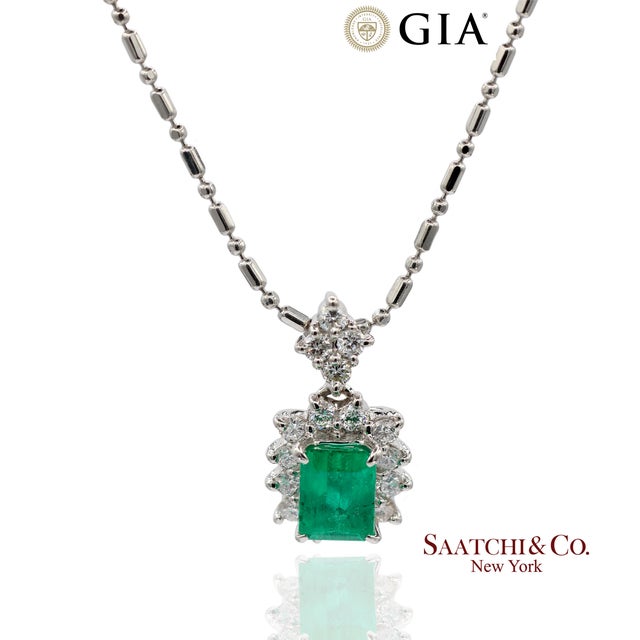 GIA Certified Emerald and Diamond Pendant Necklace Metal Type: 900 Platinum, 850 Platinum Total Item Weight: 6.5 Grams...