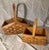 The Left Basket: This is a vintage Longaberger Slanted Vegetable/Sleigh Basket. It is distinguished by its unique angled...