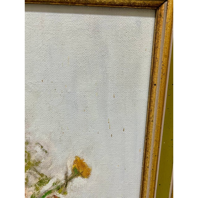 Charming vintage floral still life painted in the reverse side of a vintage game board. Gilt wood frame. Original framers...