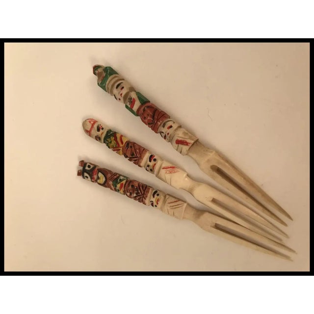 Wonderful set of three vintage Native American Totem forks, hand carved and uniquely painted. They measure around 5 inches...