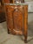 More information coming soon… This French corner cabinet from the 1700s is adorned with musical trophies on the two doors....