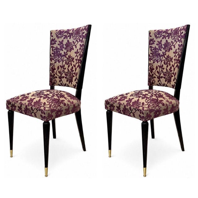 Elegant set of six Italian Mid-Century dining chairs, circa 1960's, distinguished by their tall, slender proportions and...