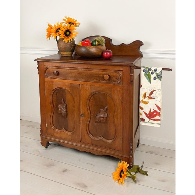 This ca 1870 walnut washstand is such a unique and versatile antique piece! Sturdy solid wood construction, beautifully...