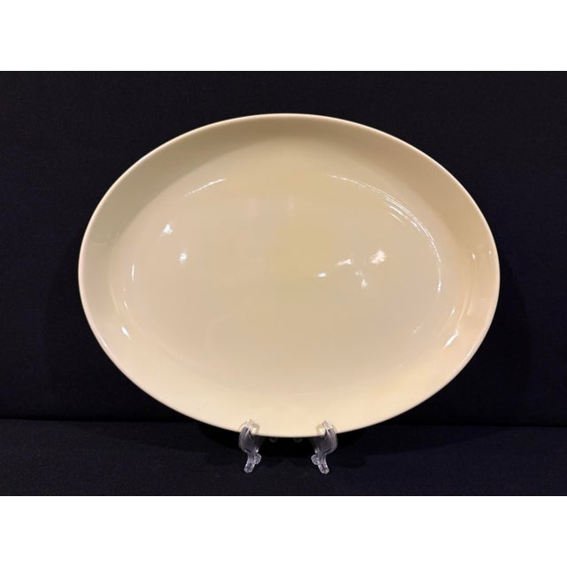 Mid-century serving platter in yellow palette from Iroquois Casual china by designer Russel Wright.