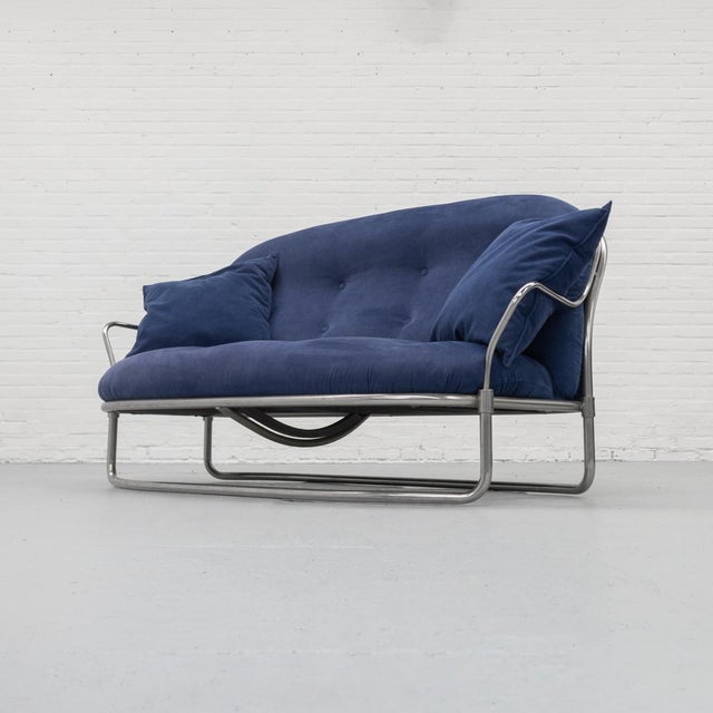 Elegant two-seat sofa designed by Carlo de Carli for Cinova, Italy, 1960s. The design is defined by a refined tubular...