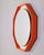Backlit wall mirror with octagonal orange wooden frame, italian design, 1970s. condition: in good condition, fully...