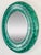 Stunning vintage hand-painted faux malachite wall mirror. Round with substantial rounded frame around a beveled glass...