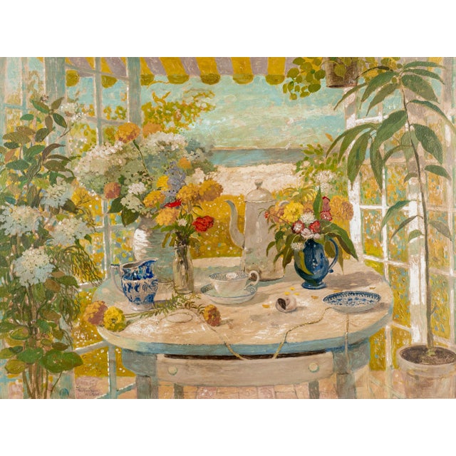 A large still life painting by Germano Russo (b.1935) featuring a round table set with colorful yellow and red and white...