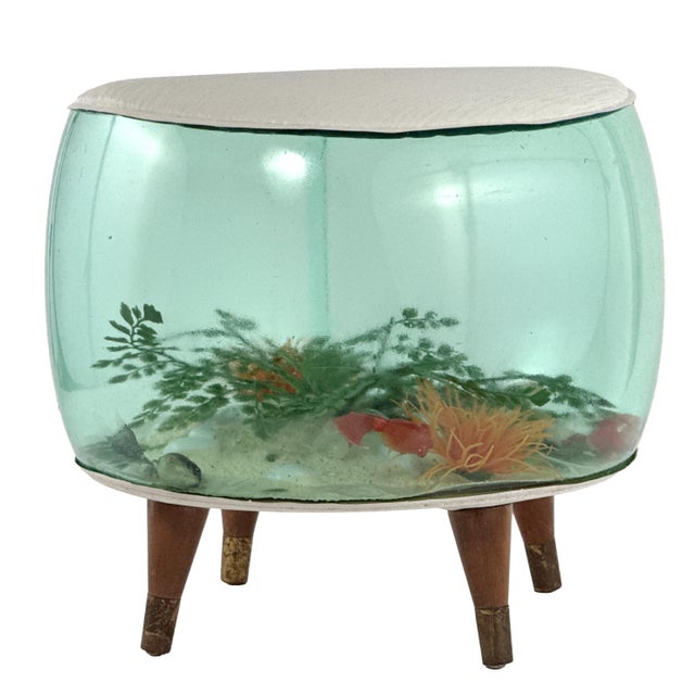 Vintage 1960s inflatable vinyl ottoman with a clear aqua colored body and an aquarium style interior filled with...