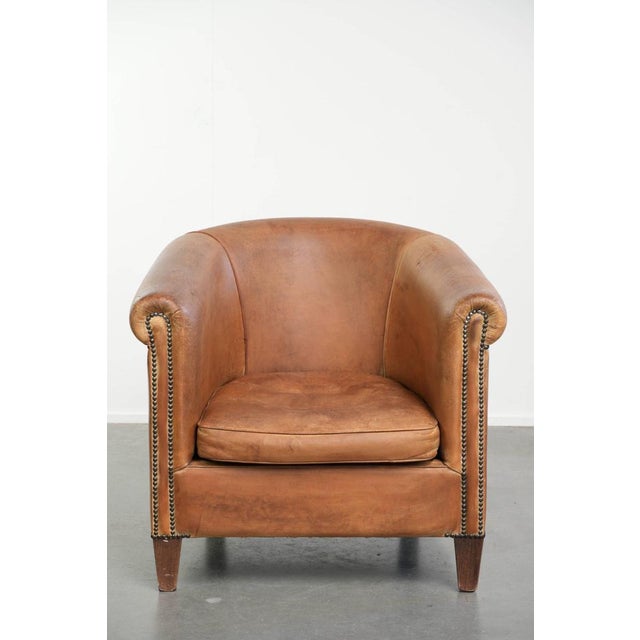 Offered by ByThijs: this delightful vintage sheepskin club armchair in a beautiful light cognac color with a gorgeous...
