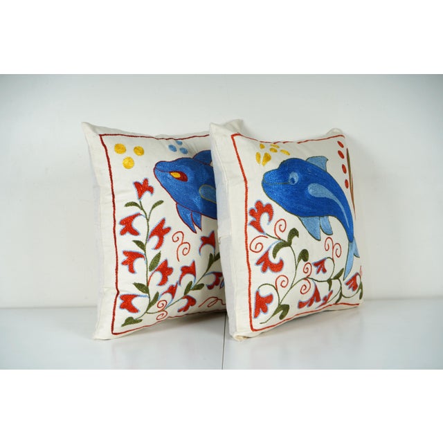 Uzbek Suzani Pillow Cover Elevate your home decor with our Turkish Suzani Pillow Cover, featuring exquisite vintage Uzbek...