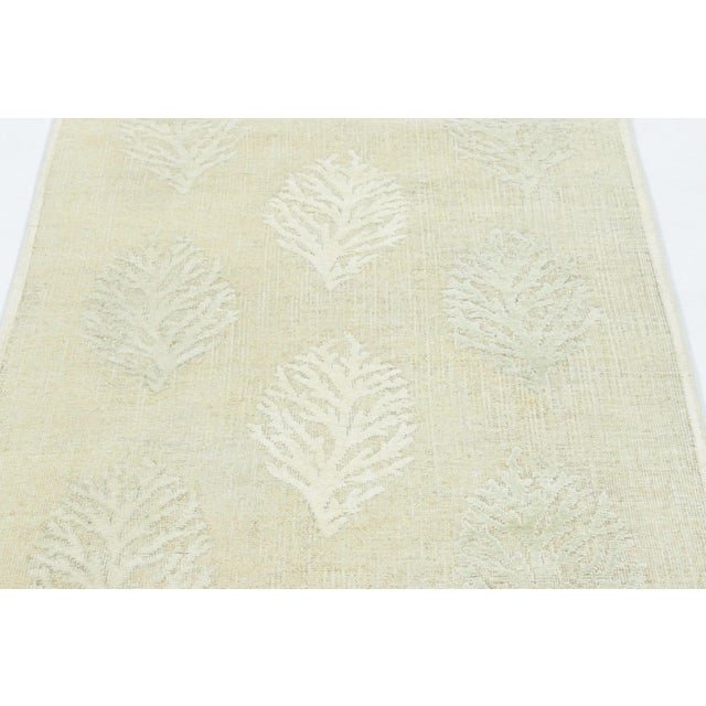 Hand-knotted in a luxurious blend of wool and silk, this 3x8 runner rug is a luminous and sophisticated addition to Rug &...