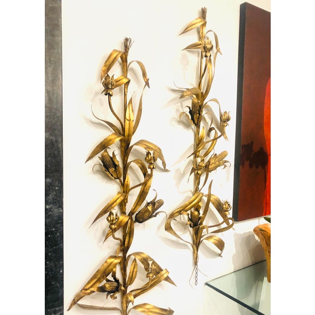 Rare Vintage Italian Gold Gilded Corn Husk Sconces. These exquisite sconces feature intricately crafted corn husk designs...