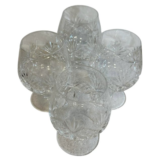 Heavy lead crystal brandy snifters with cross hatch and radiant cuts around belly of glass. Acid-etched "TIFFANY & CO" on...