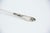 Silver Soup Ladle with Embossed Handle, in Very Good conditions. Designed 1890 to 1919 This piece has an attribution mark,...
