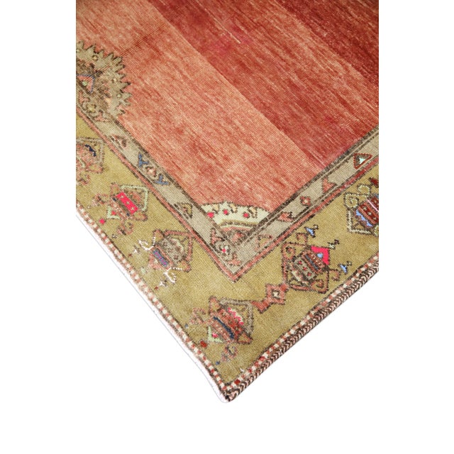 Introducing a one-of-a-kind vintage Turkish hand-knotted wool rug, carefully crafted by skilled artisans using traditional...