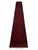 This extra-long wool runner features a deep red field filled with repeating geometric medallions in navy and warm rust...