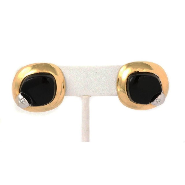 The Talento Diamond Onyx 18k Two Tone Gold Fancy Post Clip Earrings are a stunning pair of vintage and antique earrings...