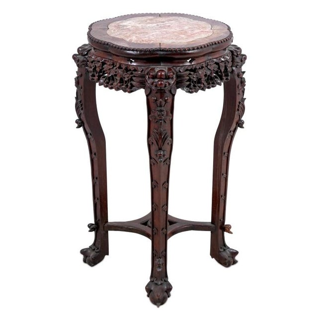 Chinese Carved Hardwood and Marble Pedestal Table, late 19th century, the lobed inset top above a pierced elaborately...