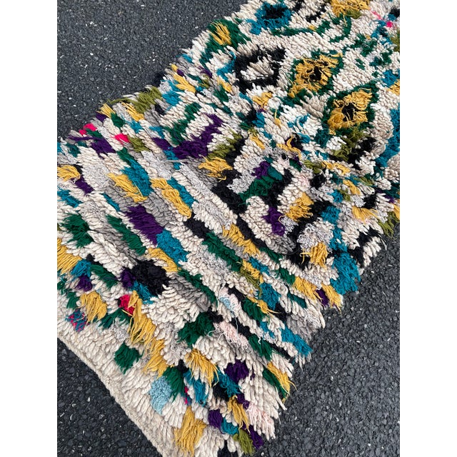Hand-woven by the Berber women in the Atlas Mountains, this Vintage rug is created with soft natural wool fibers from the...