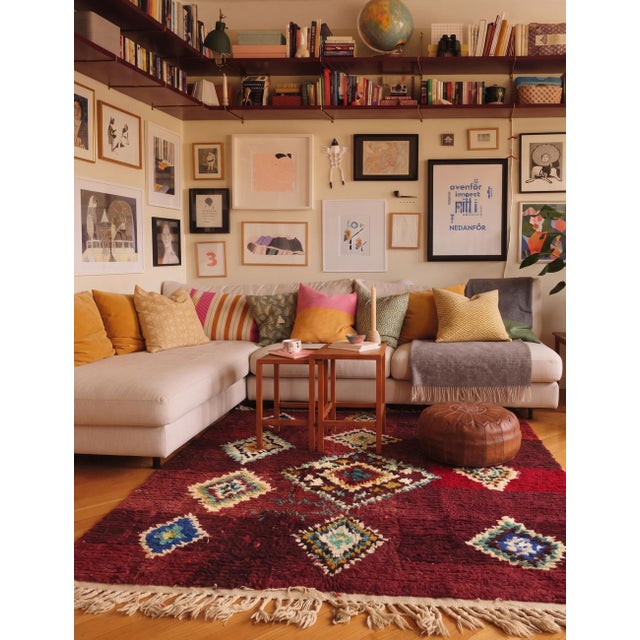 Boujad Rug | Handwoven Berber Wool Rug with Red Field and Diamond Medallions This richly detailed Boujad rug features a...