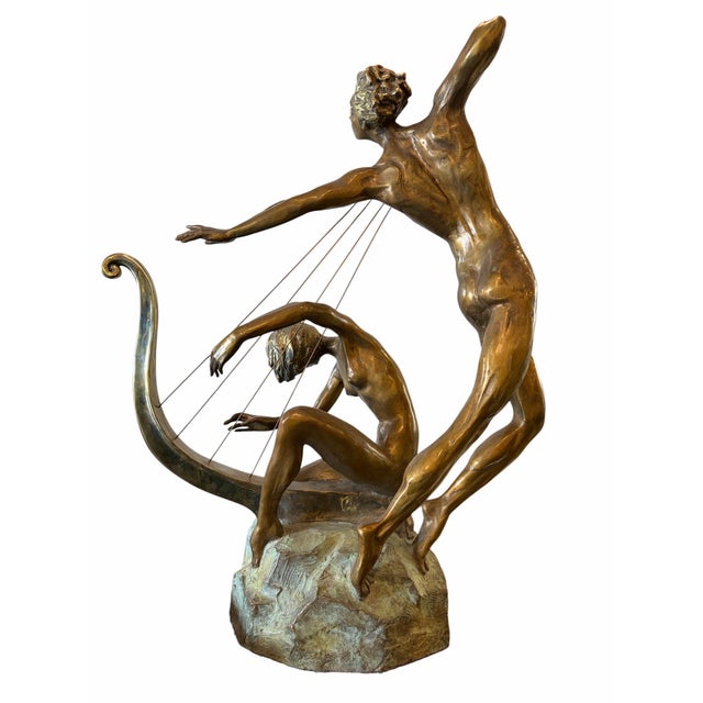 Striking bronze sculpture titled “Harp Player” by renowned Russian-American artist Misha Frid, celebrated for his lyrical...