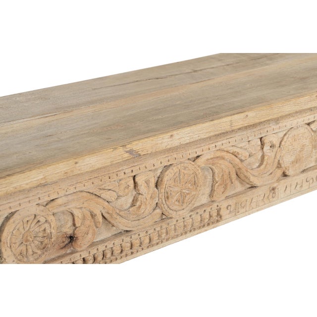 Indian Bleached Teakwood Console Table constructed from antique carvings, pillars, paneling, and reclaimed wood. Now in a...