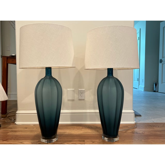 36" tall with 16" white drum shades, clear bases. Gorgeous!