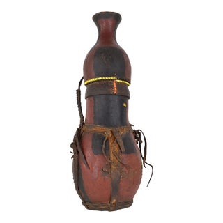 Early 20th Century Samburu Beaded Gourd Container with Leather Straps Kenya For Sale