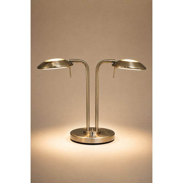An elegant twin light table lamp designed by Jan des Bouvrie a pivotal figure in Dutch minimalist design The brushed metal...