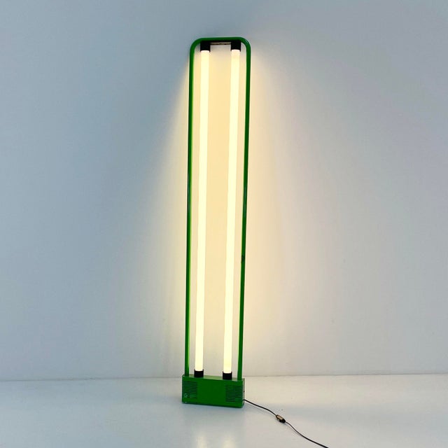 Green Double Neon Lamp by Gian N. Gigante for Zerbetto, 1980s, in Good conditions. Designed 1980 to 1989 This piece has an...
