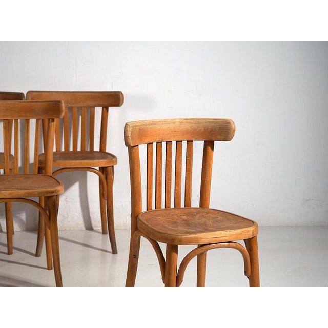 Antique Thonet bistrot chairs (c.1920) Dimensions: Piece #1: Width: 42 cm Depth: 47 cm Height: 77 cm Seat: 46 cm Piece #2:...