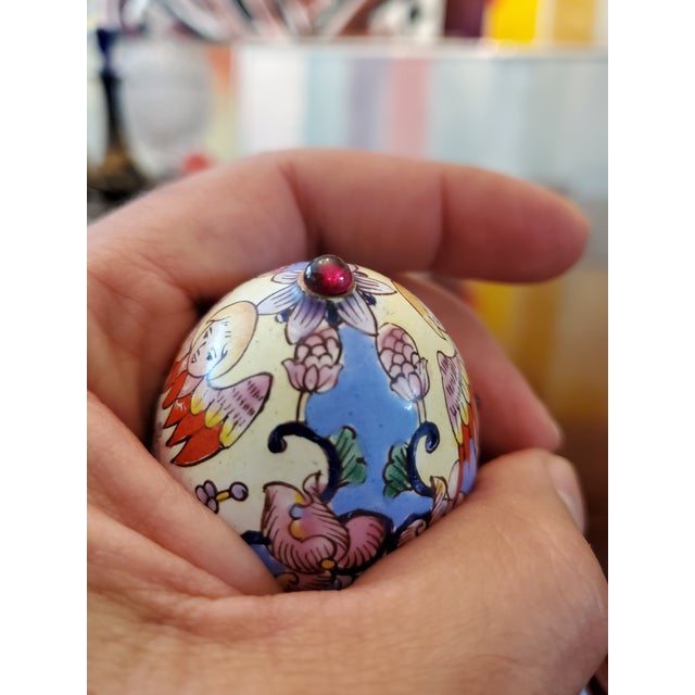 A very fine antique all hand made and applied enamel egg box with cabochon jewels. Exquisitely detailed with depictions of...