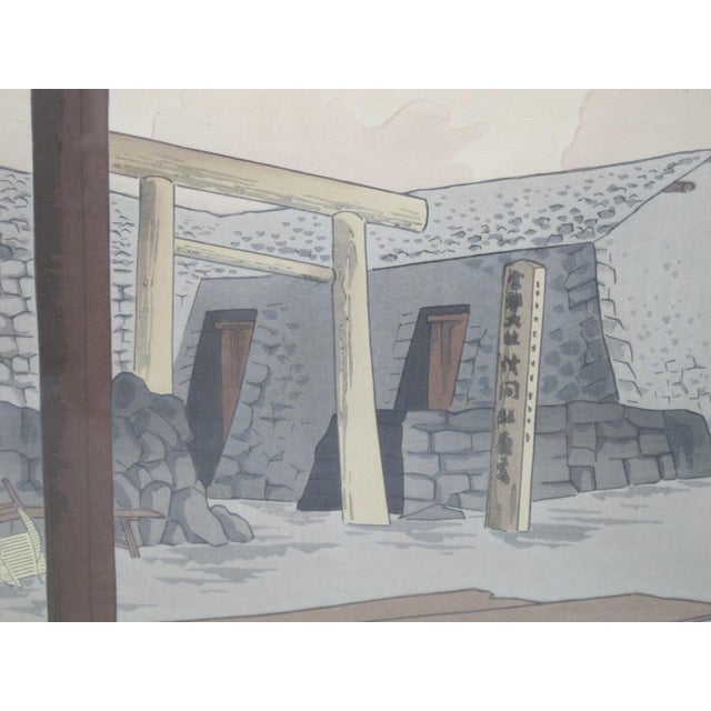 Tokuriki Tomikichiro (Japanese, 1902 - 1999) Japanese woodblock printed in 1939 of pilgrims visiting the top of Mt. Fuji,...