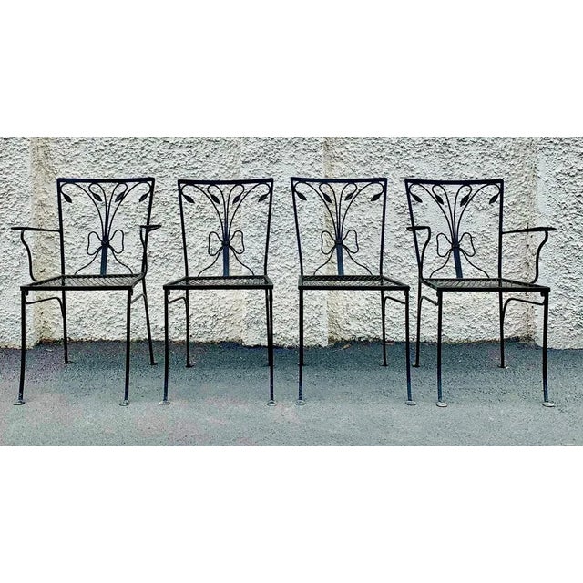 Vintage John Salterini 4 piece leaf and bow scrollwork patio garden wrought iron (2) side chairs and (2) arm chairs. Heavy...