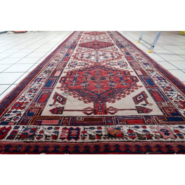 Handmade Antique Persian Serab Runner Rug – 3.3' x 10.6' – 1920s This exquisite Handmade Antique Persian Serab Runner Rug,...