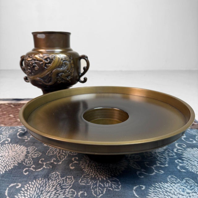 This impressive Japanese bronze usubata (a classic ceremonial ikebana vase) was designed for floral arrangement and...