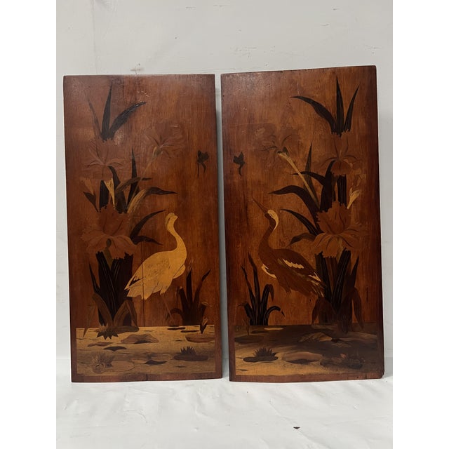 "School of Nancy" Pair of Art Nouveau marquetry panels One panel with a floral motif and the other with a pink flamingo...