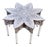 A striking handcrafted coffee table featuring an elegant flower-inspired silhouette and an intricate all-white mother-of-...