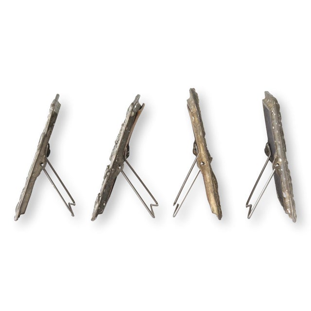 Set of four 1987 Arthur Court pewter frames featuring intricate woodland and safari animal scenes, including lions,...