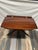 An absolute masterwork of luxury American cabinetry, this vintage mahogany drop-leaf pedestal table was bench-made by...