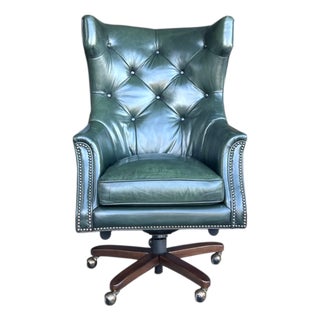 1960s English Traditional Distressed Green Leather Wingback Executive Swivel Chair For Sale