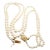 Vintage Mikimoto double strand necklace featuring luminous, graduated Akoya pearls and a beautifully engraved 18k yellow...